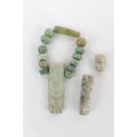 Collection of Green stone M?ori carvings and beads C.1900