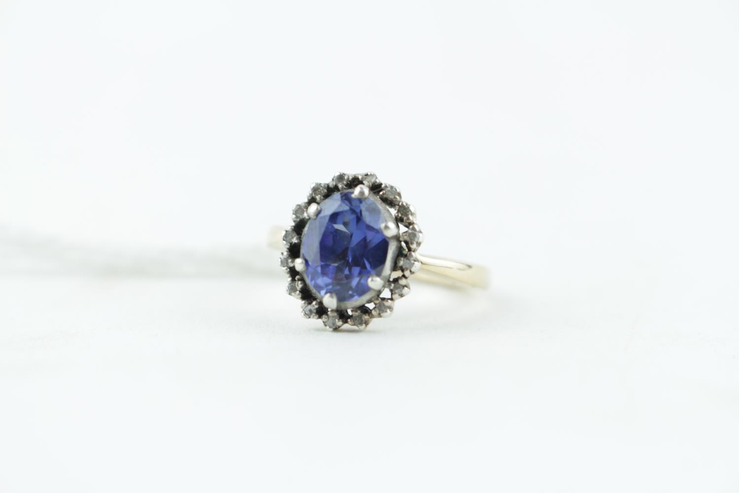 Ladies 9ct and Silver set Sapphire cluster ring 4.3g total weight. Size L