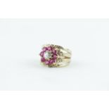 1970s Design Yellow metal Diamond and Pink Spinel cluster ring on wide banded mount, 5.7g total