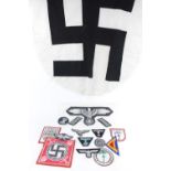 Collection of mostly Reproduction Third Reich German Insignia and cloth emblems