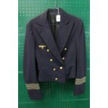 German Pre War U Boat Commanders Mess Jacket with embroidered badge and Brass anchor buttons,