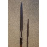 2 African Tribal Spears, one with twin sided broad blade, wooden handle and metal tail 154cm in