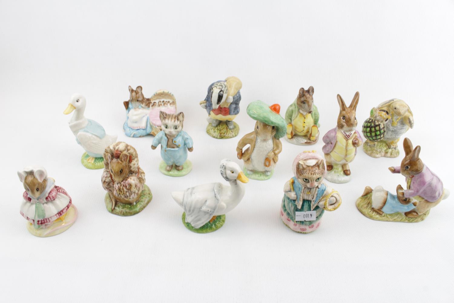 Collection of 13 Beswick Beatrix Potter Figurines mostly with brown backstamps