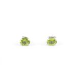 Pair of Good Quality Oval Cut Peridot Silver claw set Stud earrings