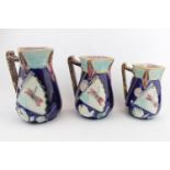 Set of 3 Good Quality Majolica graduated Jugs with Chinese Fan and Butterfly decoration, with