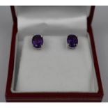 Pair of Good Quality Oval Cut Amethyst Silver claw set Stud earrings