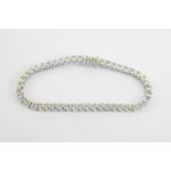 A Impressive 18ct White Gold Diamond Set Tennis Bracelet 10.80ct total approx comprising of 46 Round