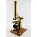 W Biles of London Brass Microscope in fitted Mahogany case with Lenses and accessories