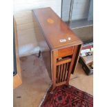 An Edwardian mahogany Sutherland table