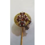 A yellow metal stick pin set enamel fleur de lys on buckle surround Ricordo di Quarto (i.c.)