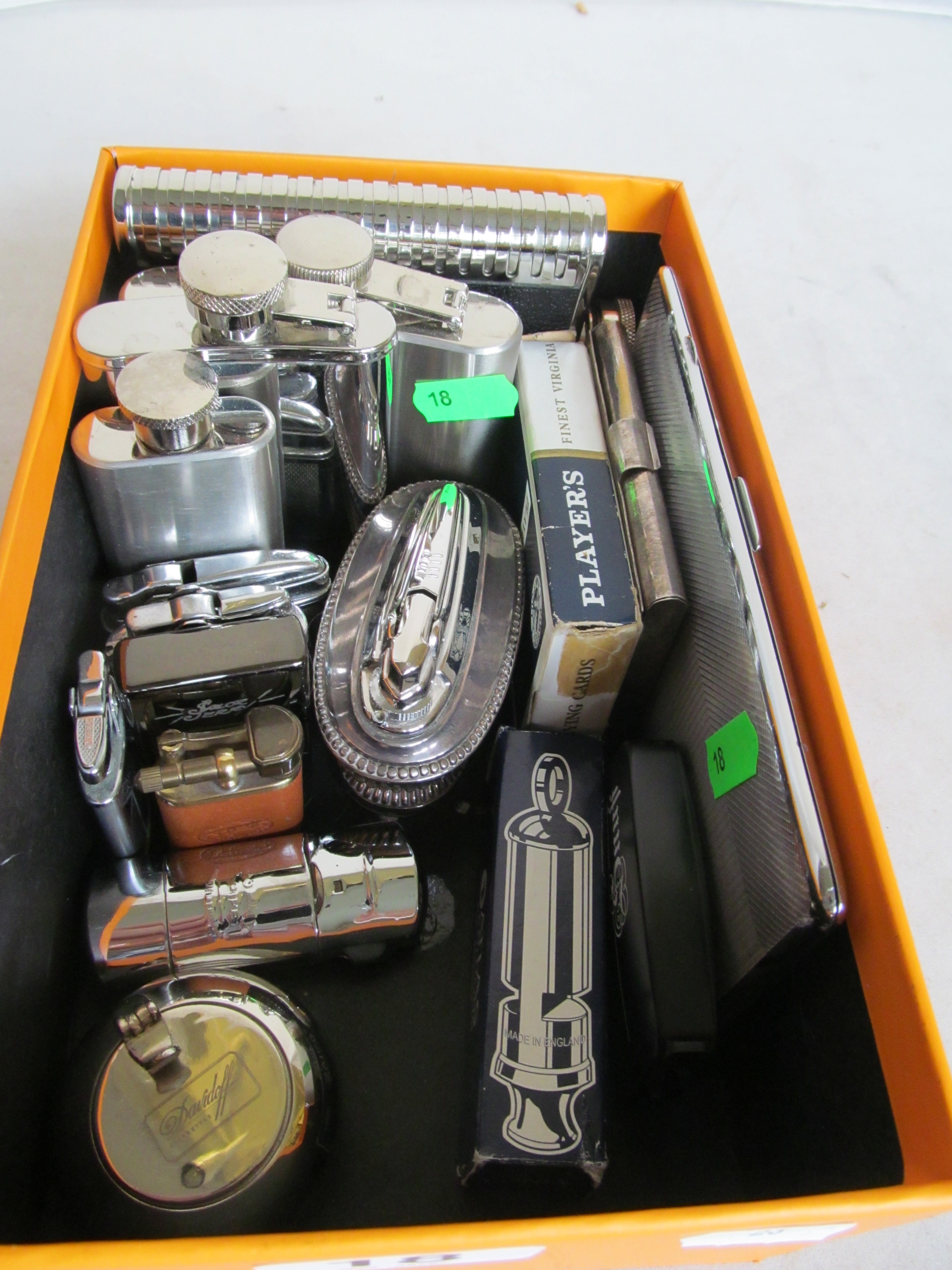 Some hip flasks, cigarette lighters and related items