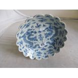 A late 19th Century Chinese blue and white dish of dragon decoration.