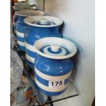 Three blue and white striped Cornish Ware storage jars