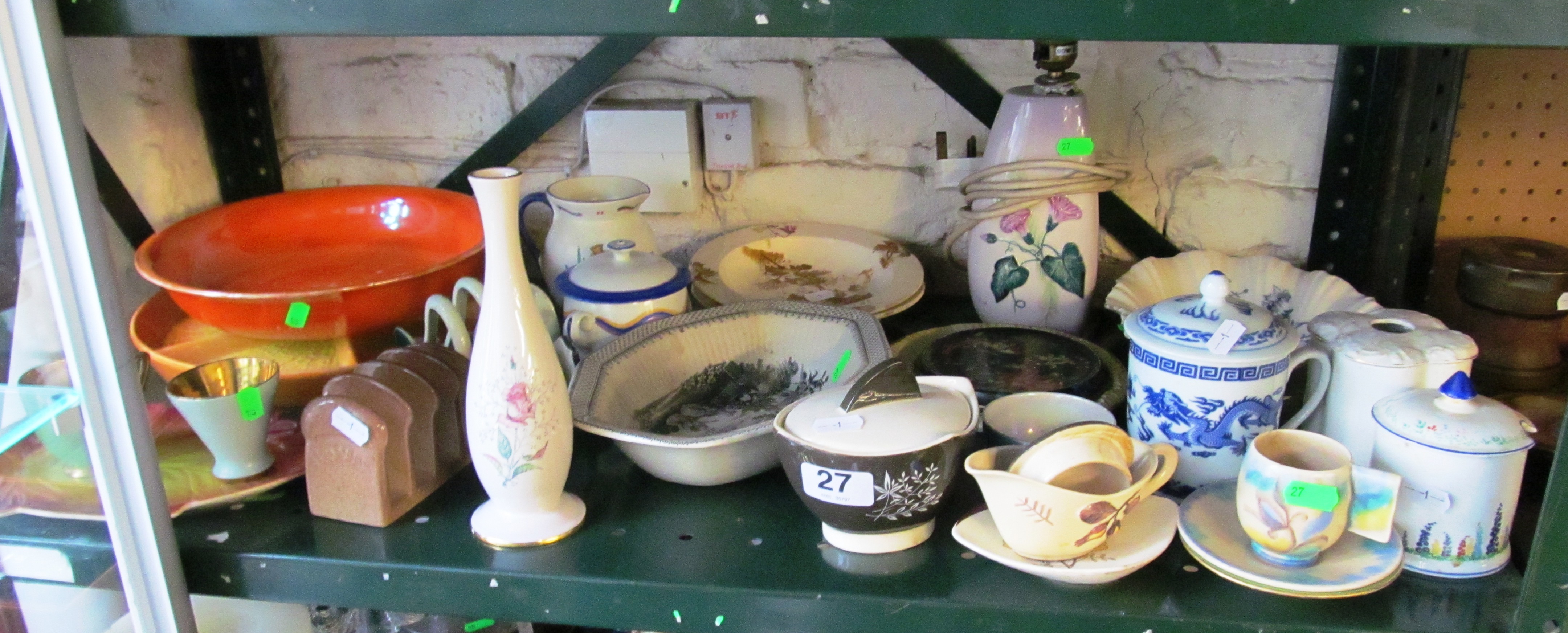 An orange Carlton bowl and other Carlton ware.