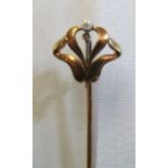 An Art Nouveau style stick pin set seed pearl and diamond chip (boxed)