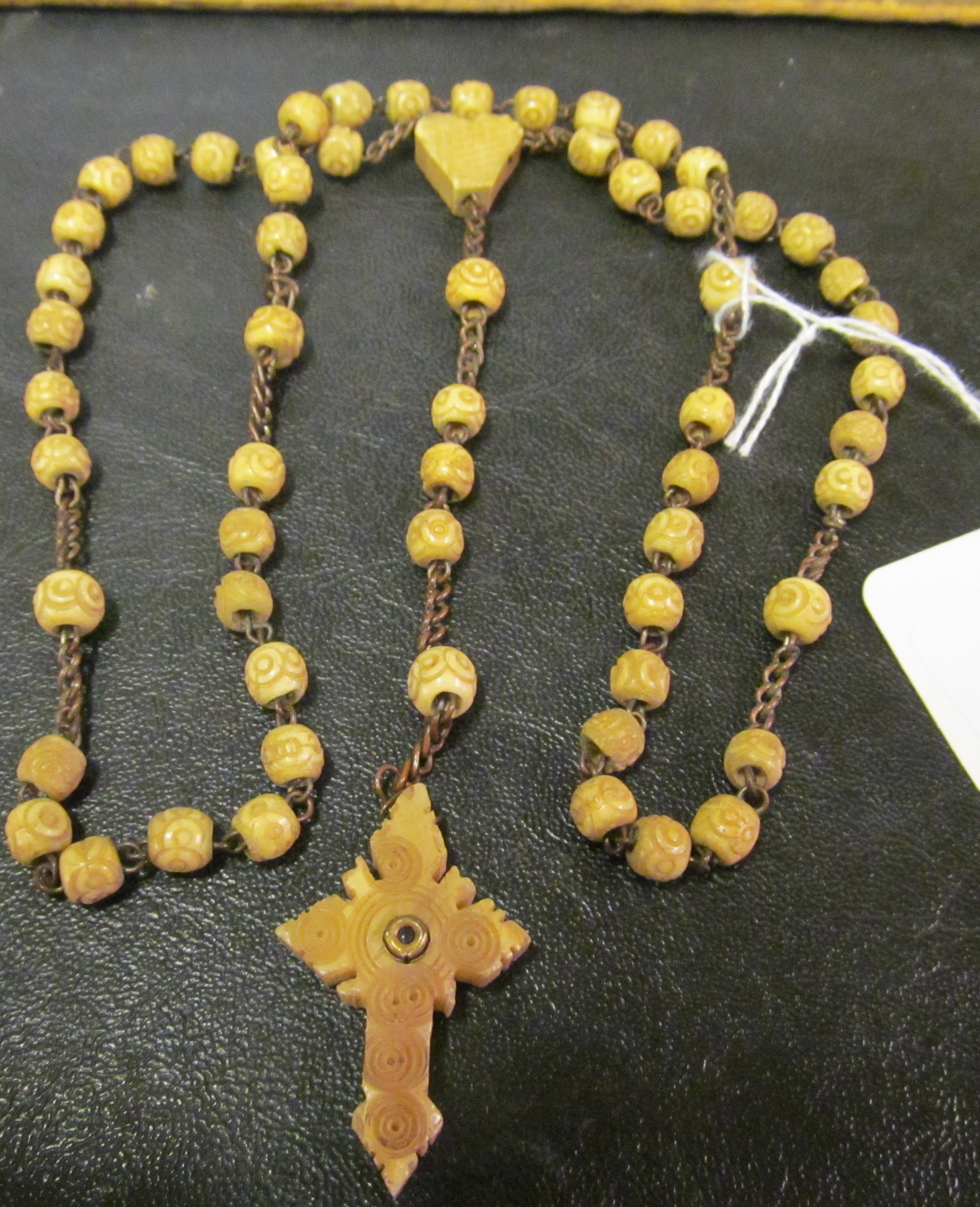 A rosary necklace with Stanhope