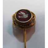 A yellow metal stick pin with micro mosaic of a dove within pierced and rope twist (i.c.)