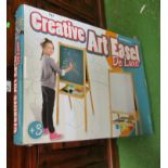 A Merkell child's creative Art Easel (boxed as new).