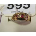 An 18ct gold ruby and diamond ring 2.5gms.