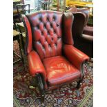 A similar wing style armchair