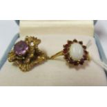 A 9ct gold opal and garnet cluster ring, and a 9ct gold amethyst cluster ring.