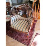 An Edwardian inlaid chair on cabriole legs (repaired).