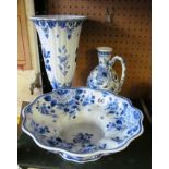 A Delft blue and white floral bowl, vase and jug.