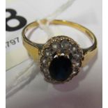 A 9k gold blue and white stone cluster ring
