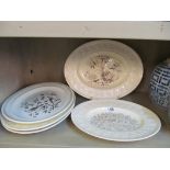 Five Wedgwood cream plates.