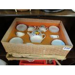 A toy teaset boxed