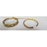 A 9ct gold band and 9ct gold band