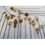 A silver golf club hat pin and other Edwardian hat pins including a Charles Horner thistle shaped