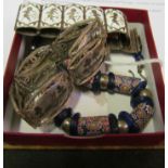 A millefiori bead necklace, a Thai white metal bracelet and an Egyptian bracelet