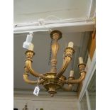 A gilt coloured six branch ceiling light