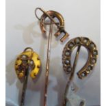 Three Victorian horseshoe shaped stick pins