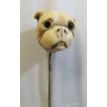A Victorian stick pin carved ivory dogs' head with glass eyes (one deficient)