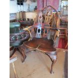 A Gothic style Windsor chair on cabriole legs with crinoline stretcher