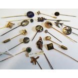 A 14k gold and seed pearl stick pin of a bird, Masonic stick pin and other stick pins