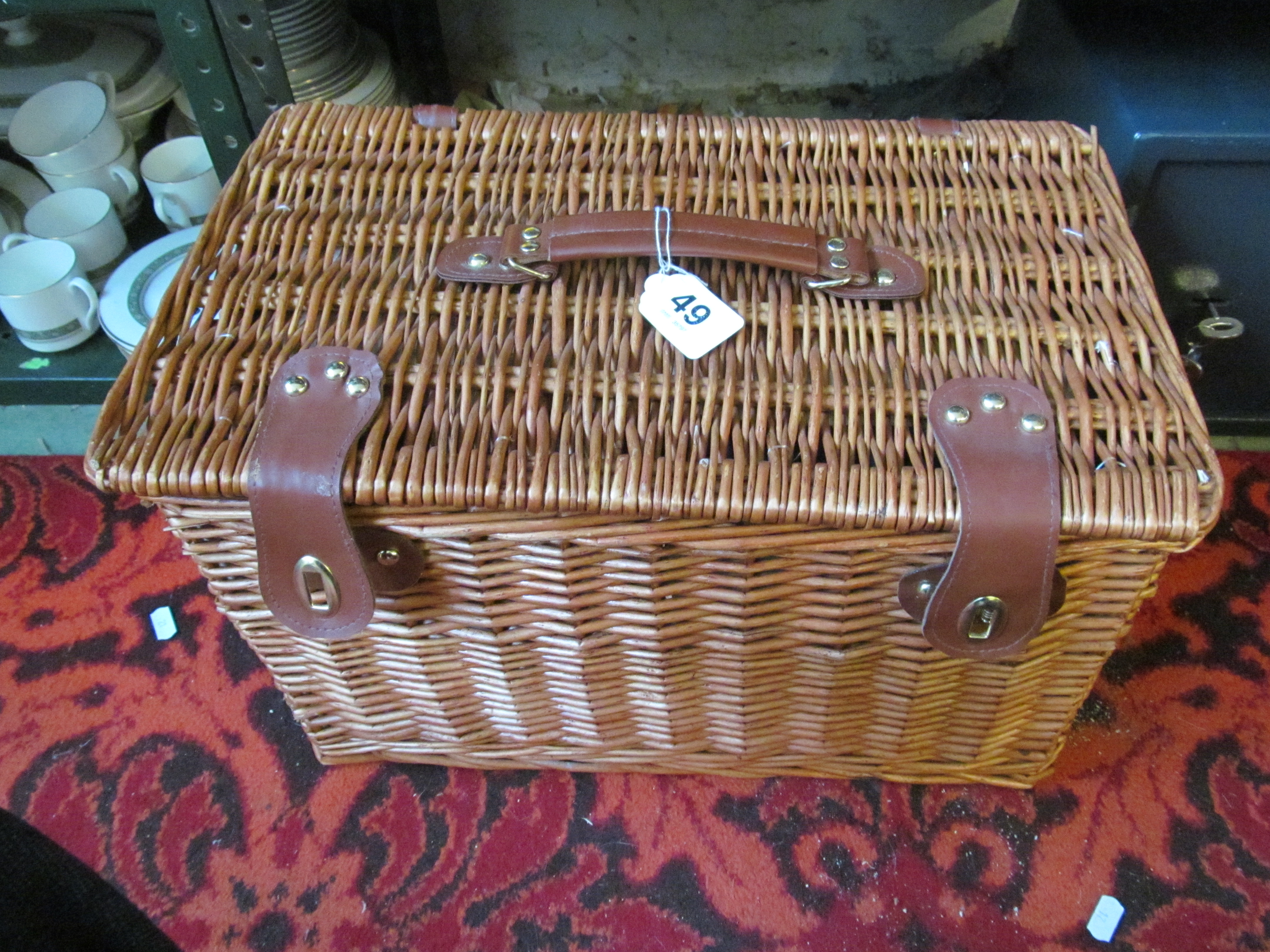 A Wicker picnic hamper fitted with cutlery, glasses, etc.