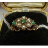 A 9ct gold pearl and green stone ring 3.1grms