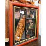 A framed montage picture of model rowing boat and boat related items