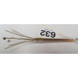 A 9ct gold propelling swizzle stick