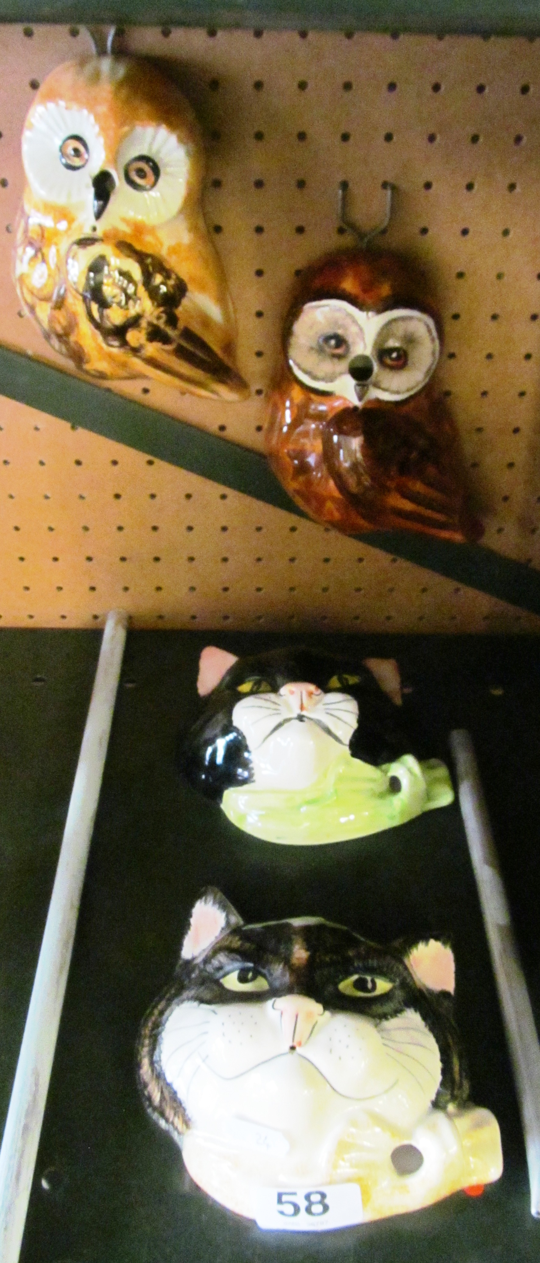 Two cat wall masks and two owls