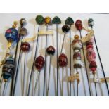 A group of hat pins with Venetian glass terminals