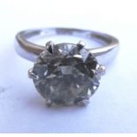 An 18ct gold single stone diamond ring with inclusions, weight 4ct.