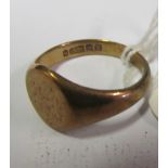 A 9ct gold signet ring.