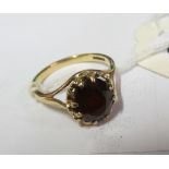A 9ct gold garnet ring