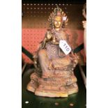 A gilt metal Easter figure Goddess seated on throne.
