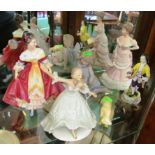 A Royal Doulton figure Southern Belle, Lladro figure (a/f) and three other figures and cat and