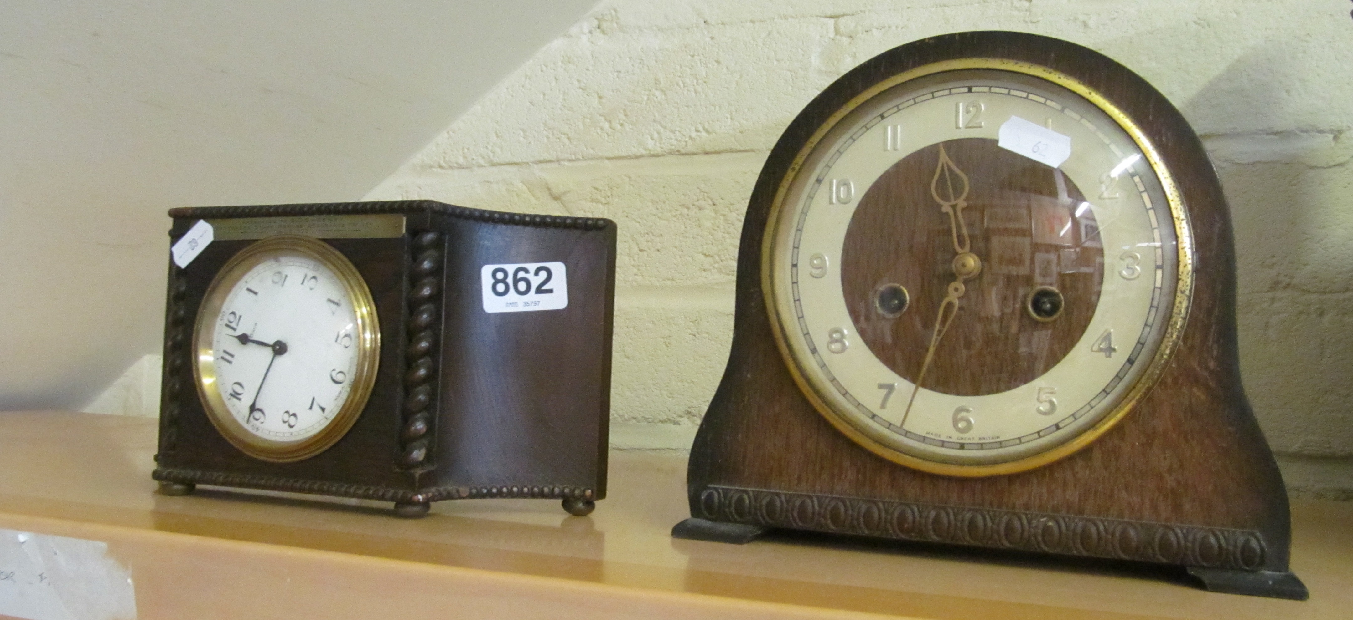 An oak mantel clock and another.